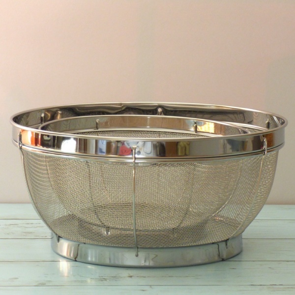 Set of two large stainless steel sieves