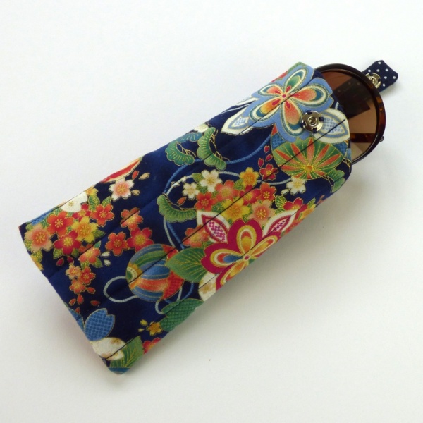 Sunglasses case in dark blue traditional Japanese fabric with sunglasses inserted