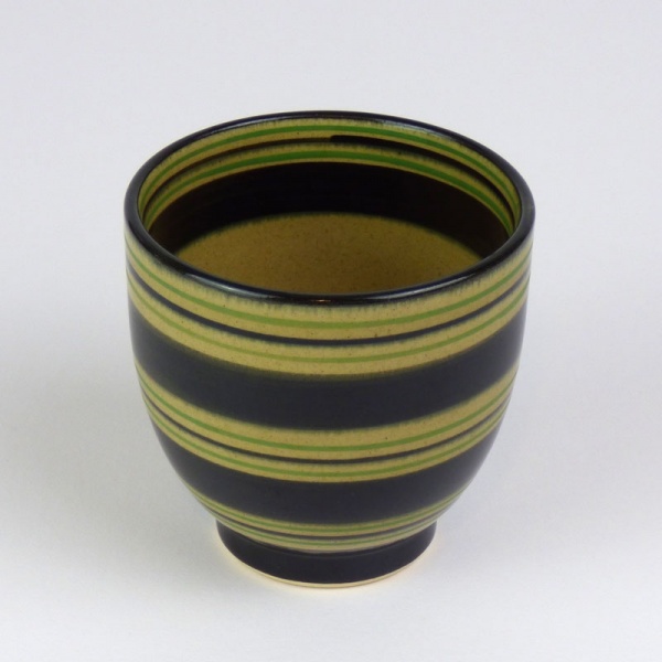Black Japanese tea cup with green stripe pattern
