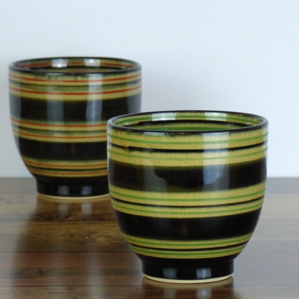 Pair of Japanese tea cups with green and red stripe patterns