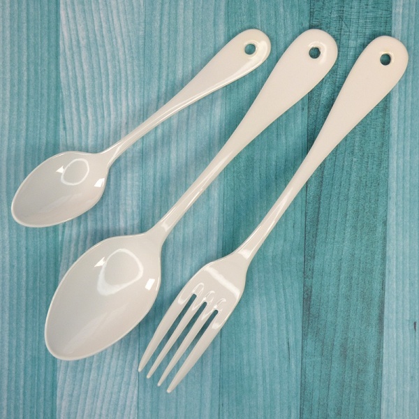 Matching white enamel teaspoon, dessert spoon and fork