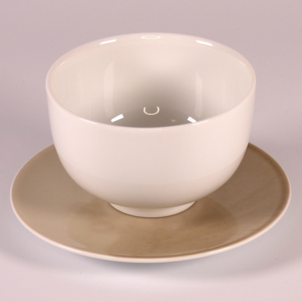 White porcelain Japanese tea cup with grey saucer