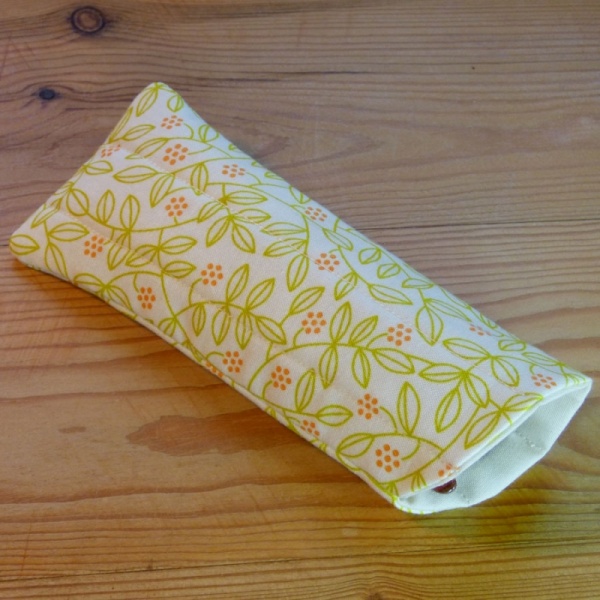 Handmade quilted glasses case in yellow leaf print