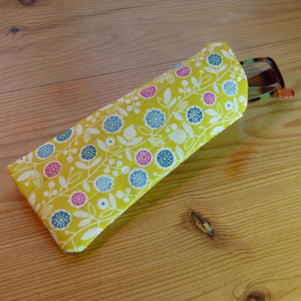 Handmade quilted glasses case in yellow vine floral print