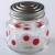 Glass storage jar with retro red and white floral design