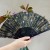 Japanese folding fan with 'Hanabi' fireworks design held in hand