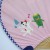 Close up of cute mythical creatures detail on reverse of Japanese uchiwa fan