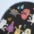 Close up of cute mythical monsters design on Japanese uchiwa fan