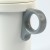 Grey removeable handle on white enamel camping mug