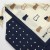 Close up of navy, brown and white cat design on cotton bento bag