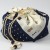 Cotton fabric bento bag with drawstring ties and stylish cat design