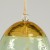 Close up of top golden moon design on glass wind chime