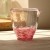 'Dancing Cherry Blossom' Japanese coloured glass jug on kitchen table