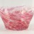 Close up of pink swirling coloured glass design