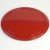 Underside of round Japanese tray in traditional lacquerware red