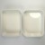Two white enamel cooking trays