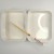 Two Japanese enamel cooking trays with saibashi cooking chopsticks