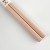 Close up of pastel pink chopstick handles
