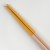 Close up of wooden tips of pastel pink chopsticks