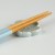 Pale blue Japanese wooden chopsticks with matching ceramic chopstick rest