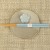 Pastel blue chopsticks and chopstick rest on muted grey plate