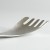 Close up of Japanese hammered metal serving fork
