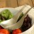 Japanese 'tsuchime' metal salad servers in bowl with green salad