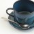 Japanese Tsuchime teaspoon on blue saucer with blue coffee cup